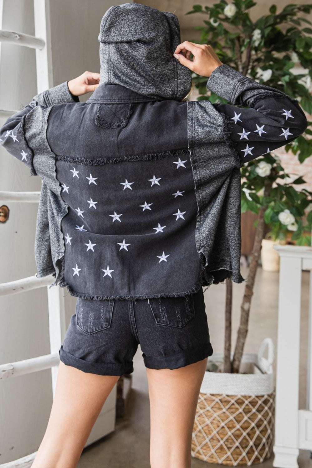 Veveret Star Embroidered Raw Hem Hooded Denim Jacket in Black