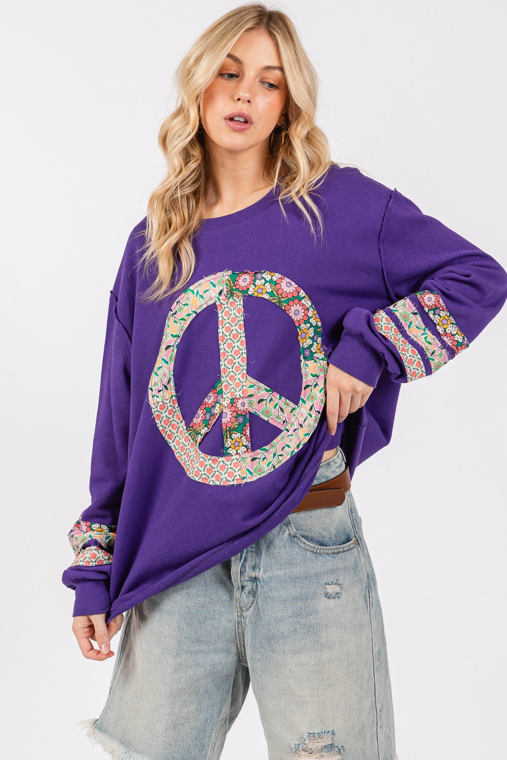 SAGE + FIG Peace Patch Exposed Seam Round Neck Tunic Top in Blueberry Purple Multi