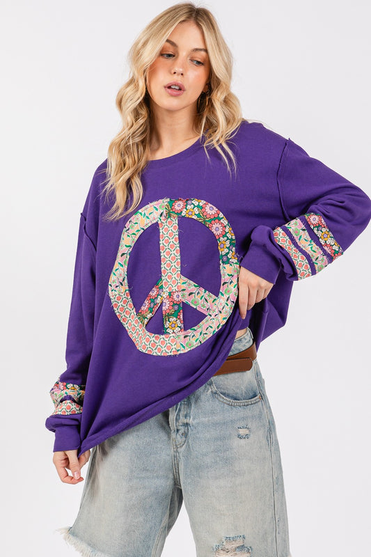 SAGE + FIG Peace Patch Exposed Seam Round Neck Tunic Top in Blueberry Purple Multi