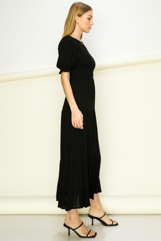 HYFVE Half Sleeve Smocked Backless Tiered Maxi Dress in Black