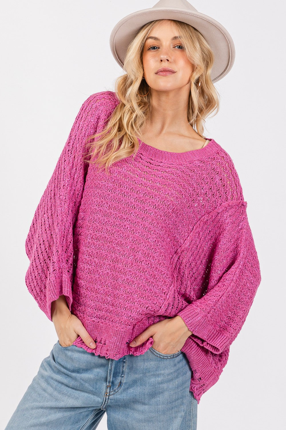 SAGE + FIG Distressed Asymmetrical Open Stitch Boat Neck Sweater in Magenta Pink