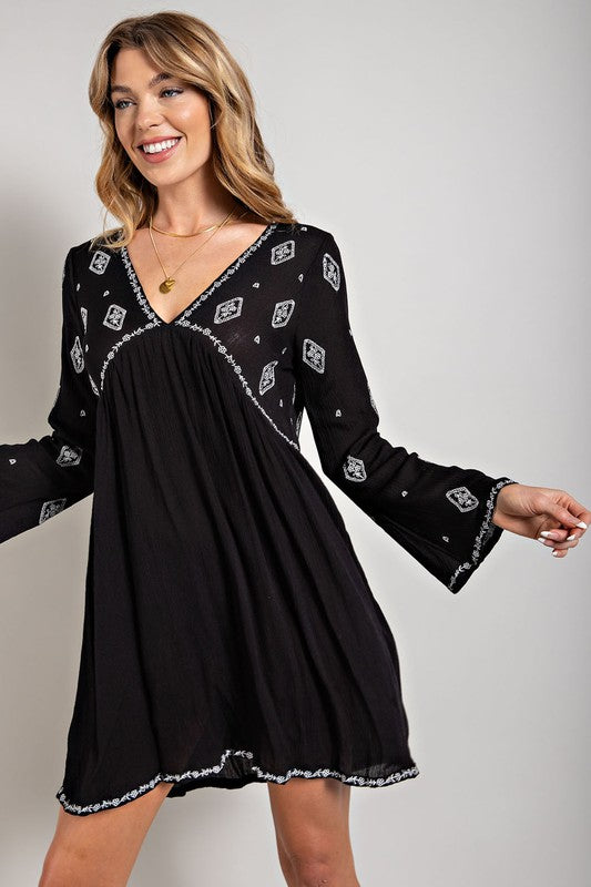 Sweet Generis Embroidered Long Sleeve Surplice Mini Dress in Black