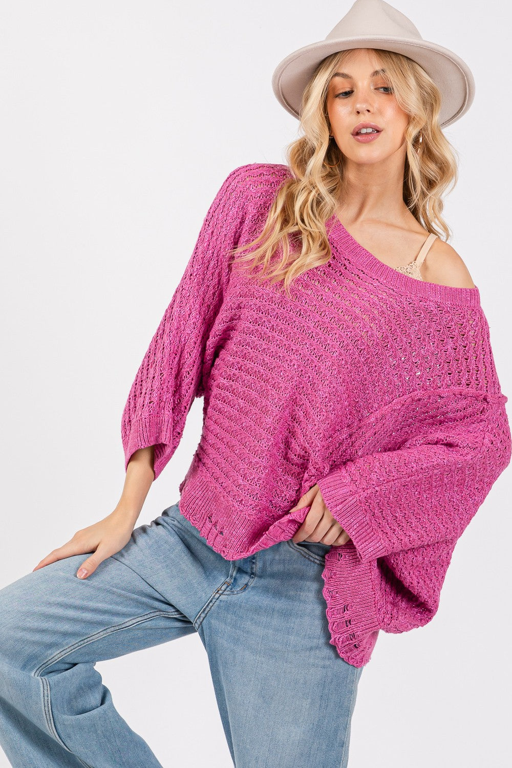 SAGE + FIG Distressed Asymmetrical Open Stitch Boat Neck Sweater in Magenta Pink