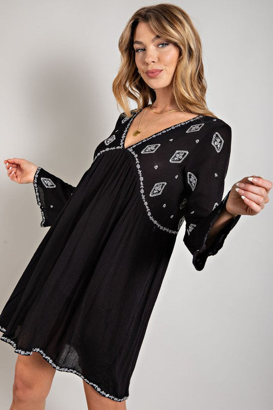 Sweet Generis Embroidered Long Sleeve Surplice Mini Dress in Black