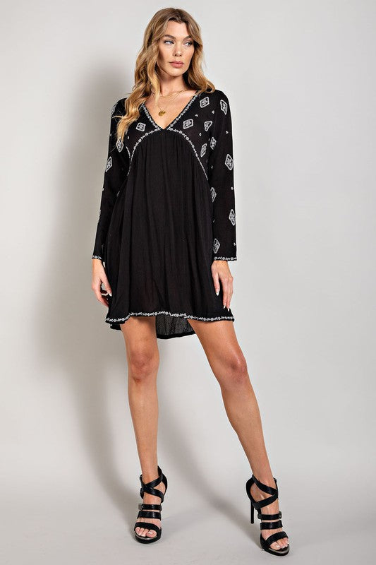 Sweet Generis Embroidered Long Sleeve Surplice Mini Dress in Black